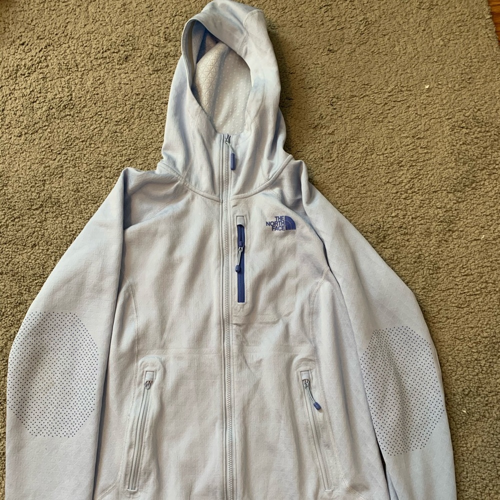 blue zip up north face sweatshirt